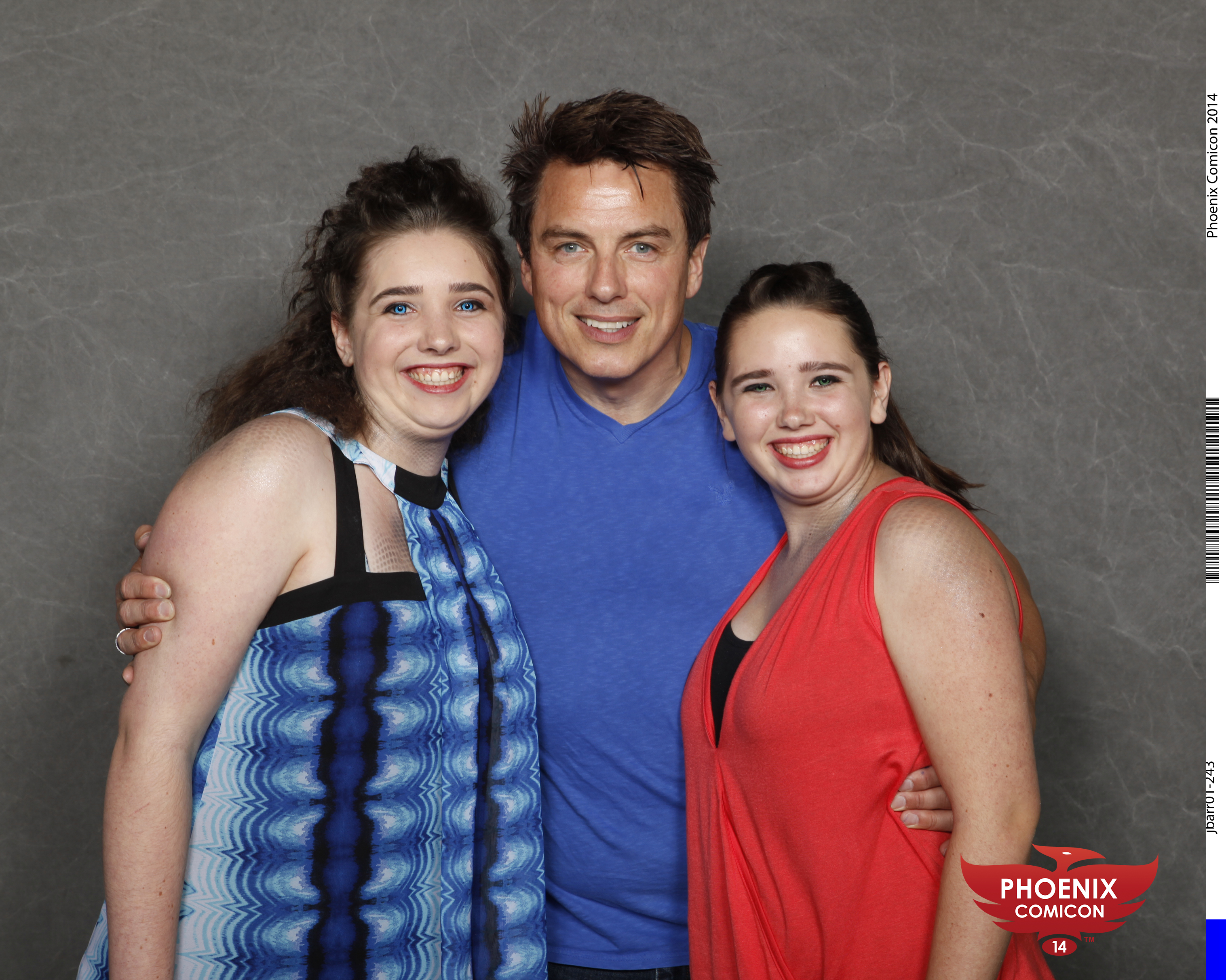 Two Mwalgi-aliens at a photo-op with John Barrowman (Phx Comicon 2014)